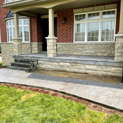 Natural Stone Porch + Stamped Concrete Walkway