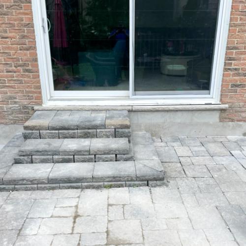 Parge damaged brick and interlock regrade